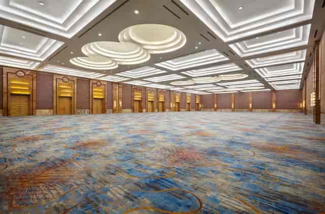 Spacious meeting room with high ceilings for conferences and banquets in The Atrium.