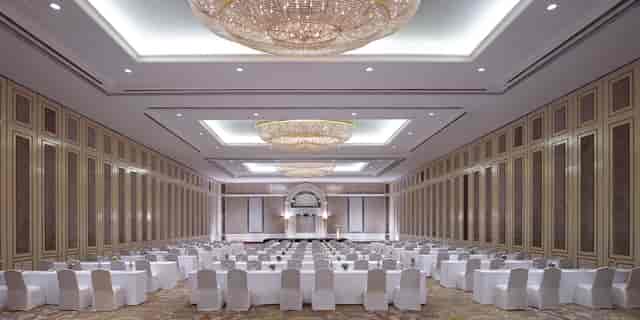 Grand Ballroom at Shangri-La Jakarta with elegant chandeliers for corporate events.