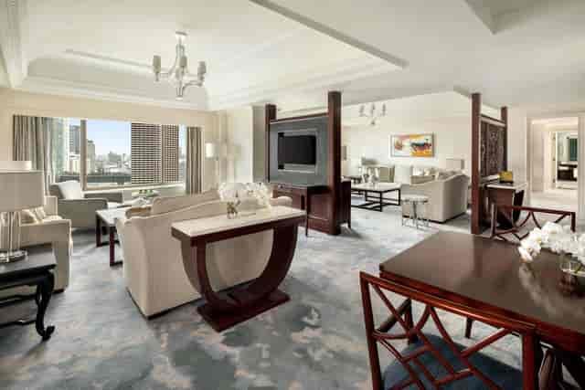 Elegant hotel suite with city views for corporate events at Shangri-La Jakarta.