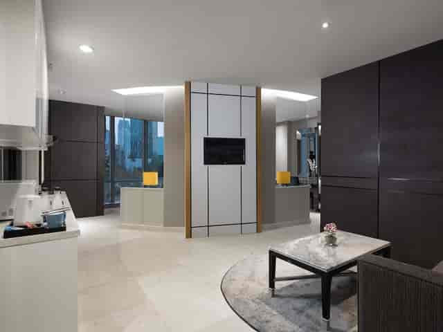 Modern meeting room at The Grove Suites, ideal for professional events and presentations.