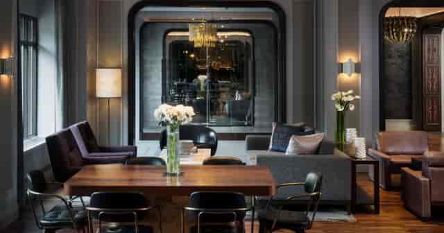 Stylish meeting space with elegant decor for corporate events at The Darcy's Pre-Function.