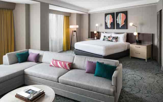Modern hotel suite at Garden Terrace, spacious living area, perfect for events and relaxation.