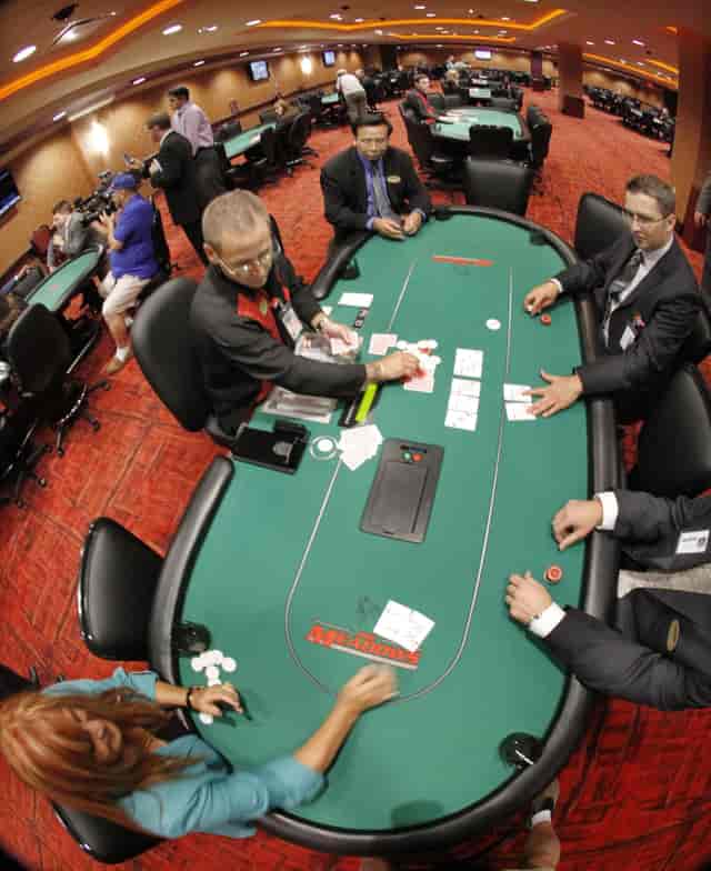 Lively casino poker tournament setting for corporate team-building events.
