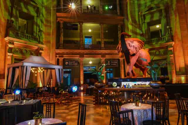 "Smithsonian National Museum Rotunda: vibrant event space with high ceilings for receptions."