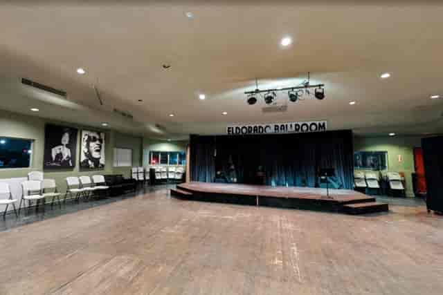 Versatile Bellagio Banquet Hall with stage and adjustable lighting for conferences and banquets.