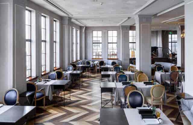 Upscale dining venue in Bund 18 for corporate events and workshops, featuring natural light.