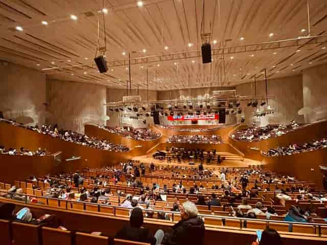 Shanghai Oriental Art Center auditorium with tiered seating for concerts and exhibitions.