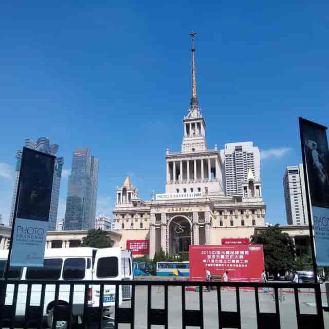 Exhibition Hall, Shanghai - grand venue with spire for conferences and events.