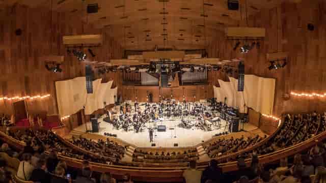 Elegant concert hall in Copenhagen with tiered seating, ideal for memorable performances.