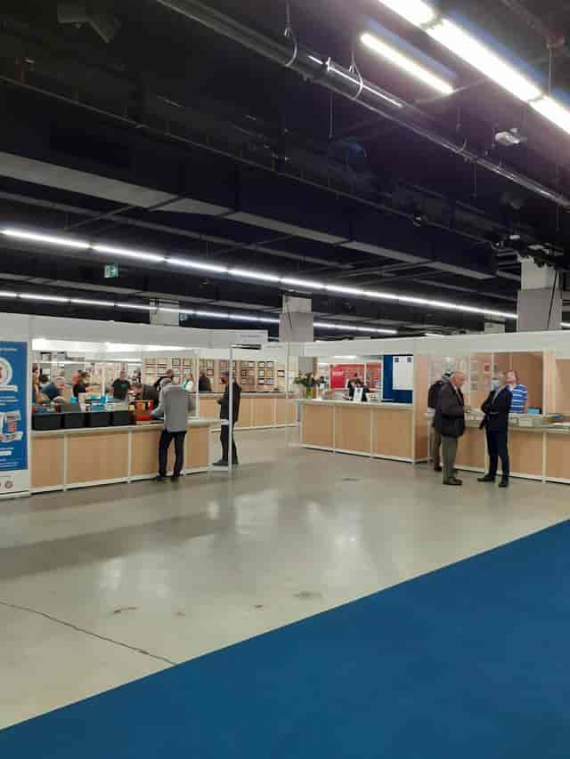 "Exhibition space in Hall C, Espace Champerret with vendor booths for networking events."