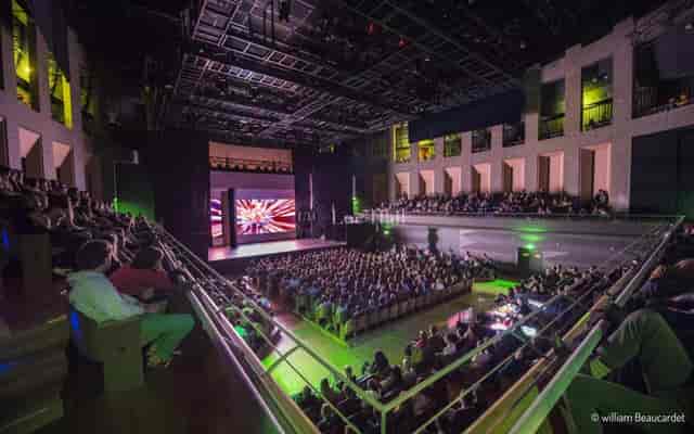 Conference Room at Philharmonie de Paris with tiered seating for engaging events.