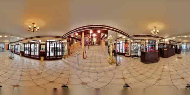 Elegant foyer with grand staircase in Théâtre du Palais-Royal for upscale events.
