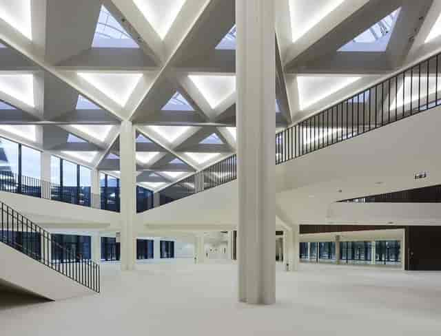 Modern convention center with geometric architecture, ideal for corporate events and meetings.