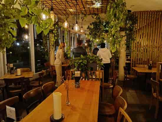Cozy garden terrace at The Artisan, perfect for informal meetings and small events.