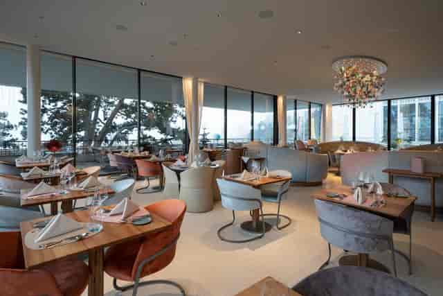 Sophisticated dining at LUX Restaurant & Bar, ideal for corporate dinners and upscale events.