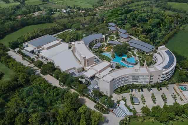 Modern meeting room at Courtyard Aravali Resort, ideal for events and conferences.