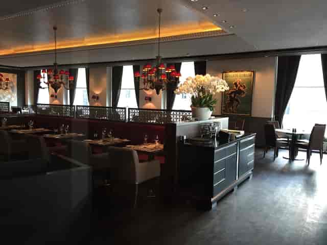 Elegant dining room at Brasserie Schiller for corporate events and gatherings.