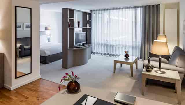 Modern Management Suite at The Mandala Hotel, ideal for corporate meetings and events.