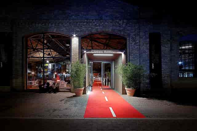 Elegant venue entrance with red carpet for upscale events like galas and corporate functions.