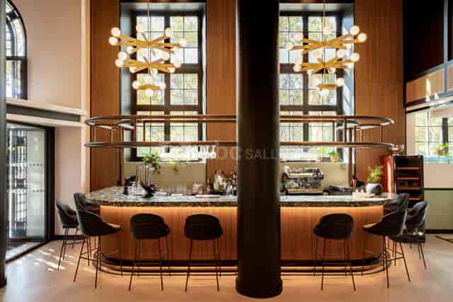 Modern bar area in Salle du Parchamp, perfect for cocktail receptions and networking events.