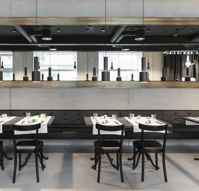 Modern bar at Placid Hotel Zurich, ideal for business meetings and events.