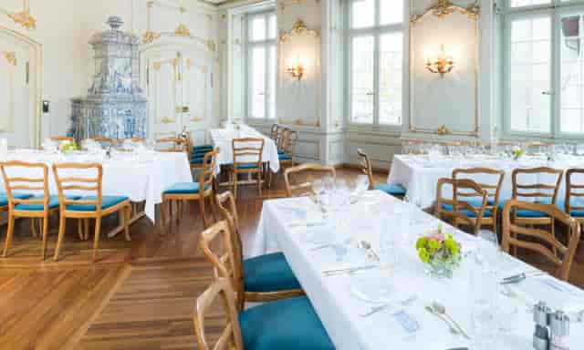 Elegant dining room at Zunfthaus zur Meisen, ideal for corporate events and formal gatherings.