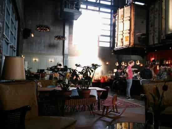 Modern restaurant interior in Kraftwerk, ideal for intimate gatherings and creative events.