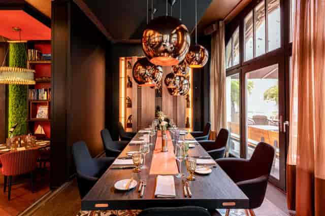 Sleek dining setup at Carlton Restaurant & Bar, ideal for corporate dinners and events.