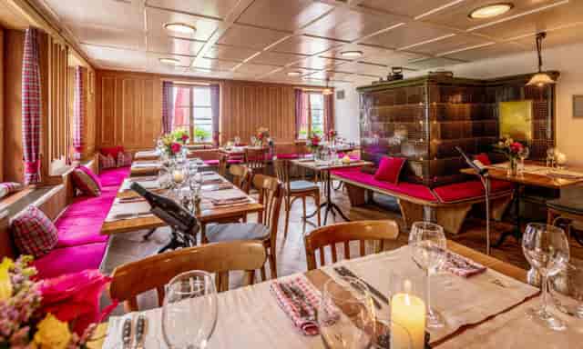 Cozy dining space at Wiesenbeiz, perfect for gatherings and meetings.