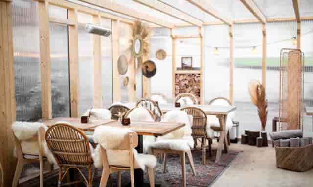 Cozy event space in Lennox Restaurant, featuring wood decor for intimate gatherings.