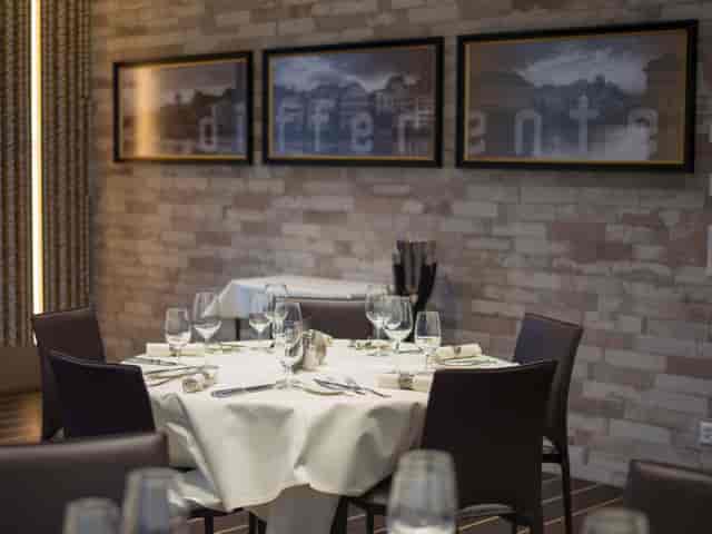 Elegant dining table at Mediterranean restaurant, perfect for upscale events and corporate dinners.