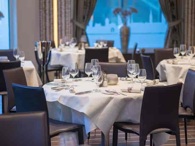 Elegant dining setup in Mediterranean restaurant, perfect for events and corporate functions.