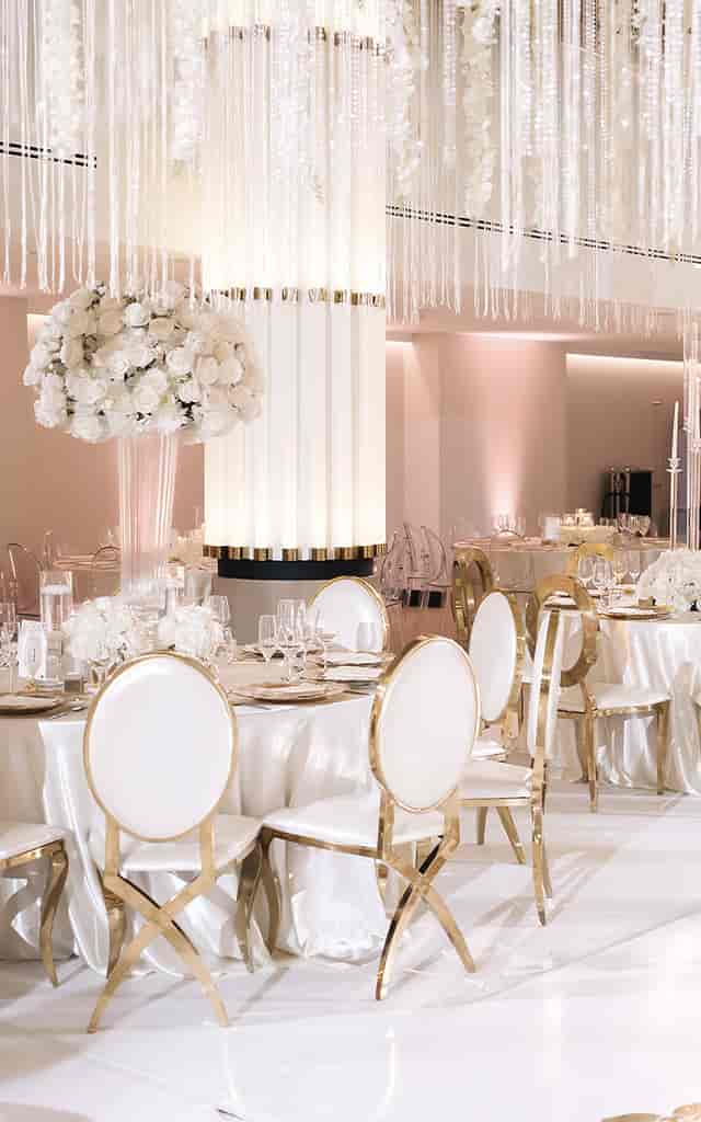Elegant Schuyler Breakout Rooms with floral centerpieces, ideal for upscale weddings and events.