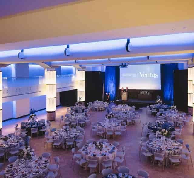 Hamilton Ballroom set for formal event with elegant lighting and floral centerpieces.