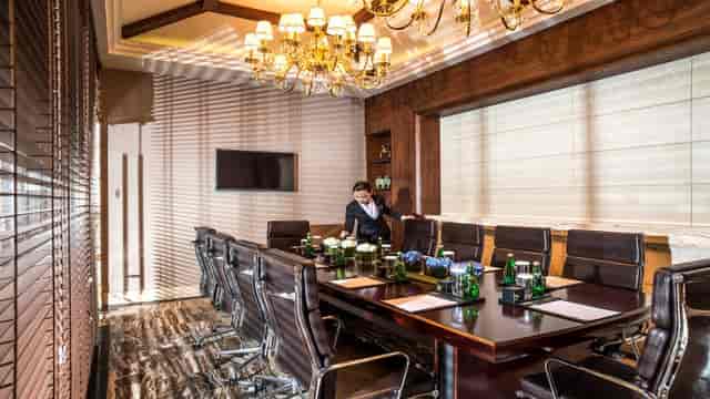 Xue Song in a luxury conference room at InterContinental Chengdu, perfect for meetings.