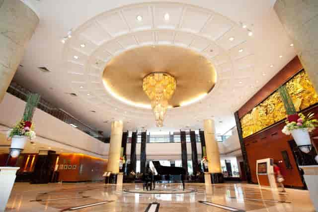 Golden Hall at Dong Fang Hotel: elegant lobby with chandelier for events and gatherings.