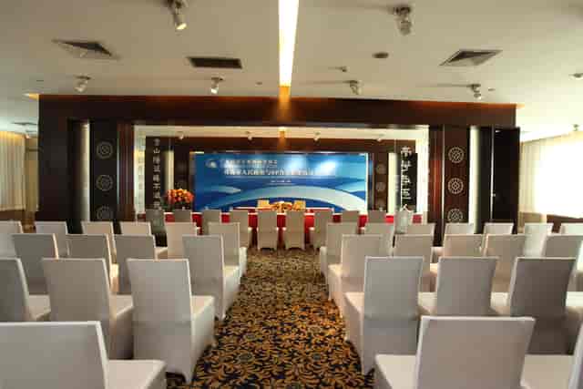 Conference room at Dong Fang Hotel, featuring elegant decor for corporate events.