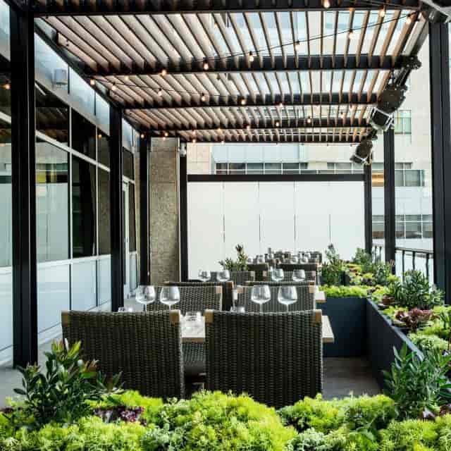 Stylish outdoor dining terrace at STEM Kitchen + Garden for elegant receptions and gatherings.