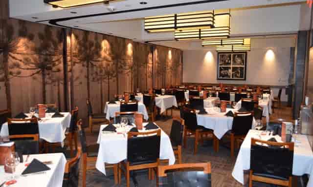 Private dining room at Fogo de Chão, elegant setting for corporate events and gatherings.
