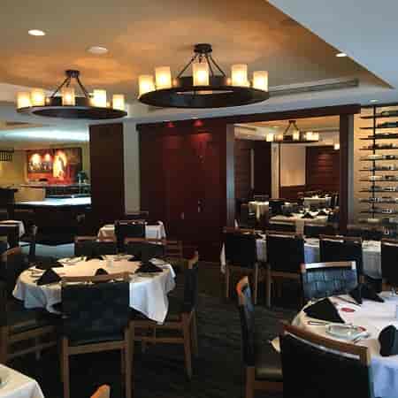 Private dining room at Fogo de Chão, elegant setting for corporate events and gatherings.