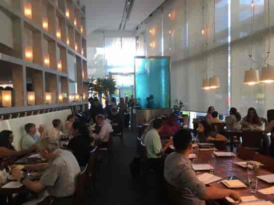 Vibrant Zaytinya restaurant with aquarium, perfect for corporate meetings and events.