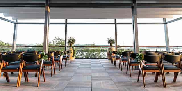 Rooftop event space at District Winery with modern decor and natural light for gatherings.