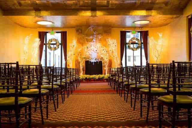 Art Deco dining setup with Chivari chairs in San Francisco event space for formal gatherings.
