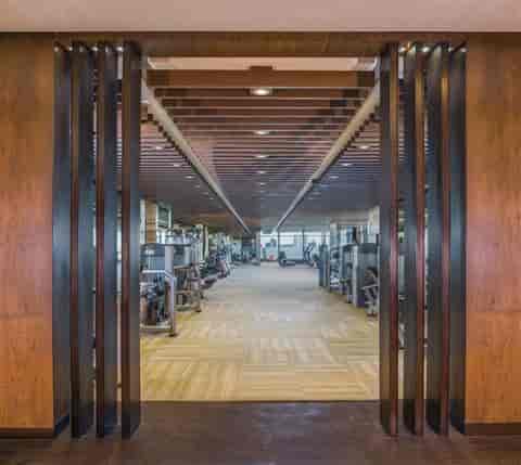 Modern fitness facility at 38 Manhattan, The St. Regis Mumbai for corporate retreats.