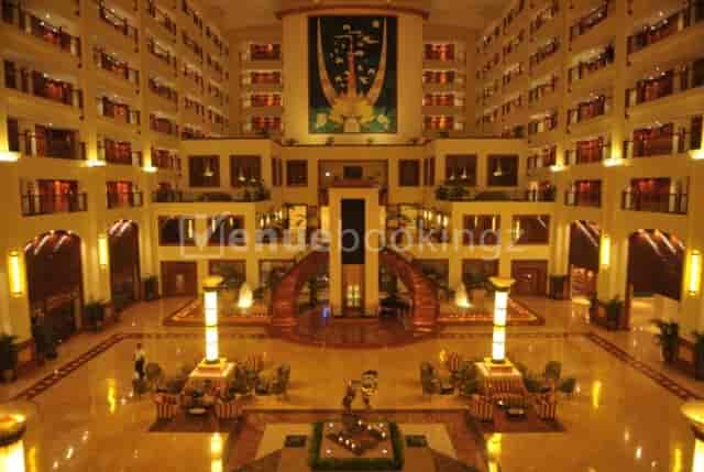 "Elegant hotel lobby at The LaLiT Mumbai for seminars and networking events."