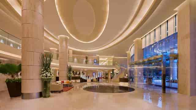 Seminar in Courtyard Mumbai Airport with sleek design and natural light, ideal for events.