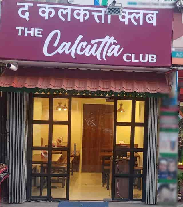 Welcoming restaurant venue with wooden tables, ideal for casual gatherings and meetings.