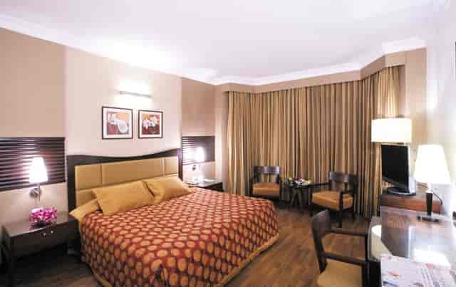 Senator hotel room with modern decor, ideal for business events and relaxation