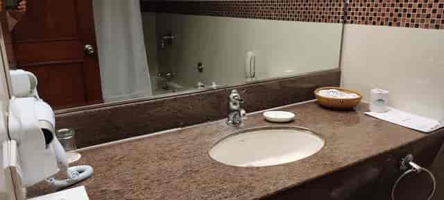 Polished granite bathroom sink at Wharfside, Retreat Hotel for events and meetings.
