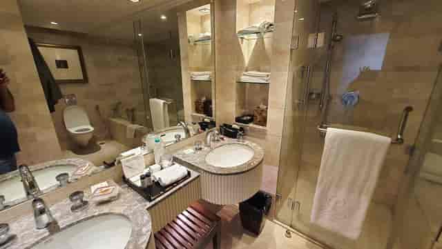 Luxury hotel bathroom in The Leela Mumbai, perfect for corporate events and meetings.